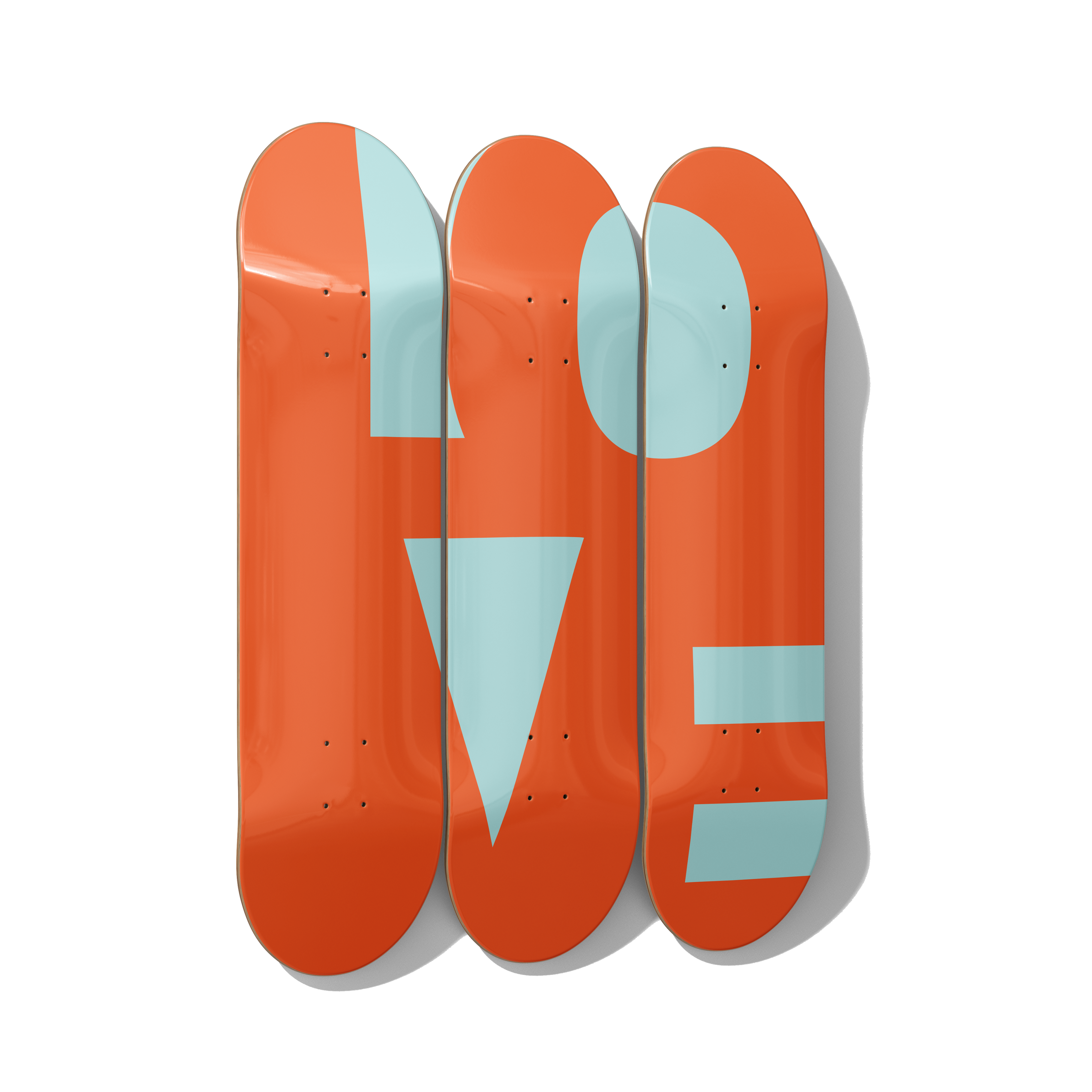 Geometric Bauhaus triptych skateboard wall art styled above a sofa